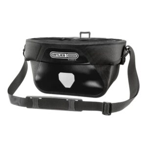 An Ortlieb Ultimate Six Classic handlebar bag is shown in a black waterproof material with a black shoulder strap visible