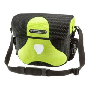 an Ortlieb Ultimate Six High Visibility bag is shown in the neon yellow colourway with a luminous reflective yarn woven into the material