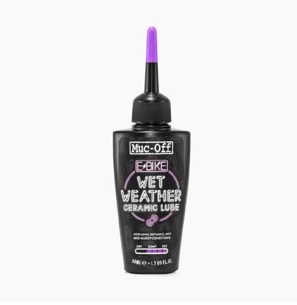 A small black bottle of Muc-Off eBike Wet Lube is shown with a purple lid