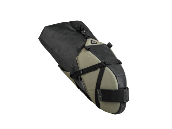A Topeak BackLoader X modular bikepacking saddle bag is shown with a olive green mounting shell & black dry bag inside, with black strapping securing it