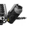 An Apidura Backcountry Downtube Pack 1.8L is shown in a black & grey waterproof material, mounted to the outside of a downtube on a bicycle