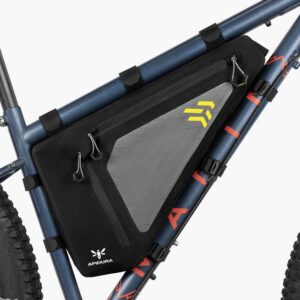 An Apidura Backcountry Full Frame Pack is shown in black & grey waterproof material, fitted inside the main triangle of a bicycle