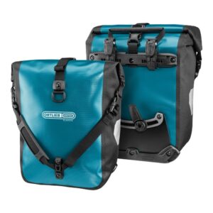 A pair of Ortlieb Sport-Roller Classic panniers are shown in a petrol blue & black waterproof material
