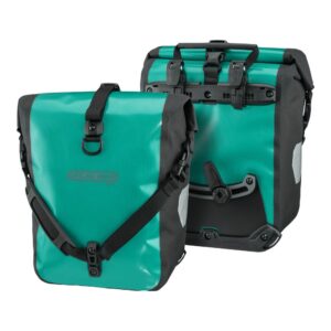 A pair of Ortlieb Sport-Roller Free panniers are shown in a lagoon green & black waterproof, PVC free material