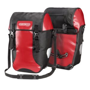 An Ortlieb Bike-Packer Classic pair of waterproof panniers is shown in a red/black colourway