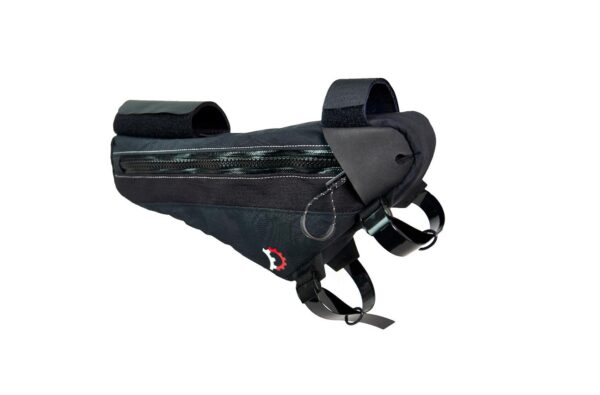 A Revelate Sandur Frame Bag for bikepacking is shown in a durable black material with a thick zipper on one side & Velcro strapping to secure it to your frame