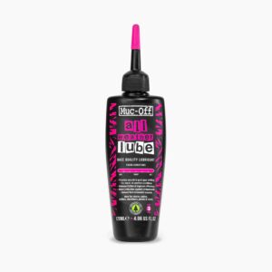 A small bottle of Muc-Off All Weather Lube is shown with a pink pipette on the top of the black bottle